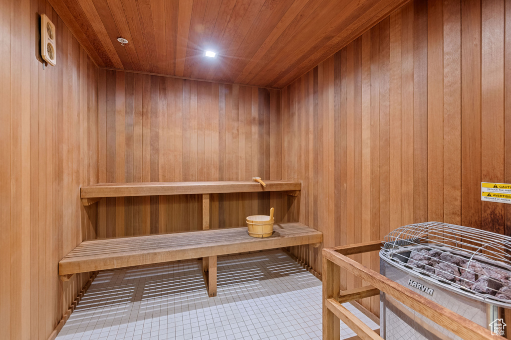 View of sauna / steam room with tile patterned floors