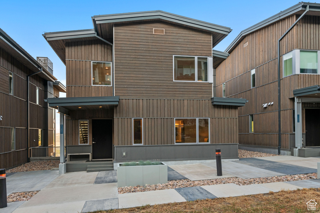 View of front of property with a patio area