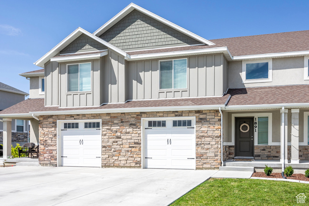 View of front of house with a garage