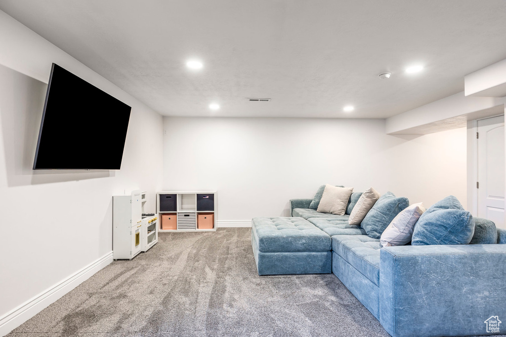 Living room featuring carpet floors