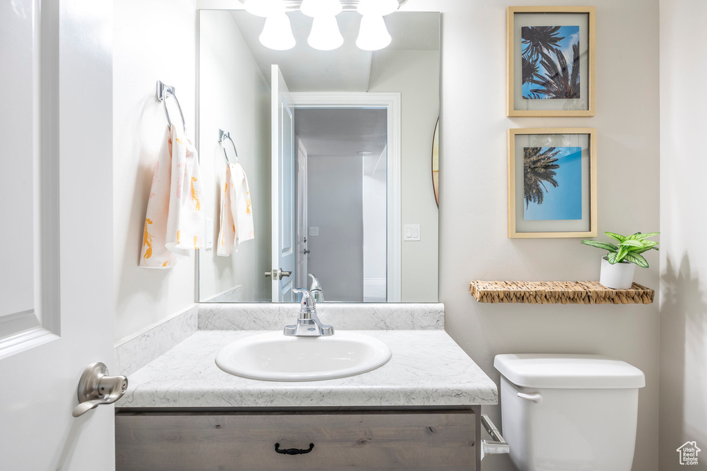 Bathroom featuring vanity and toilet