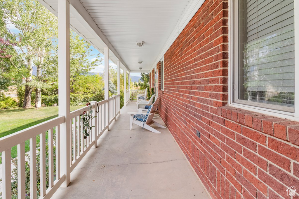 View of patio with a porch