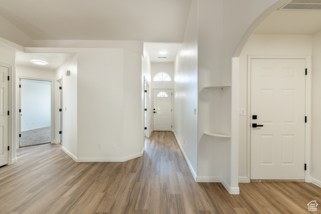 Hallway featuring hardwood / wood-style flooring