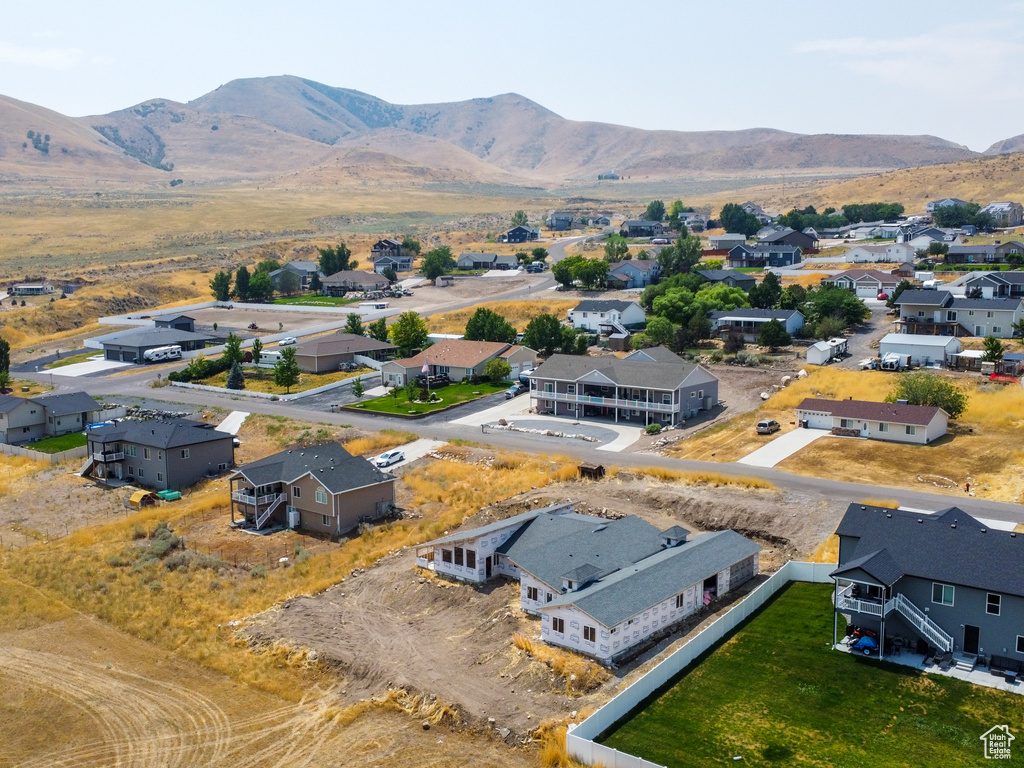 Birds eye view of property with a mountain view