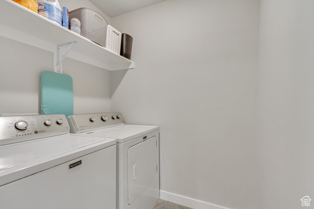 Laundry room featuring washing machine and dryer