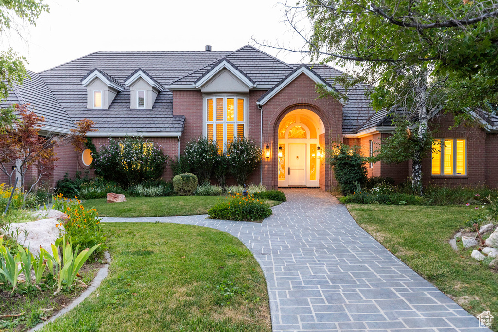 View of front of house with a front lawn