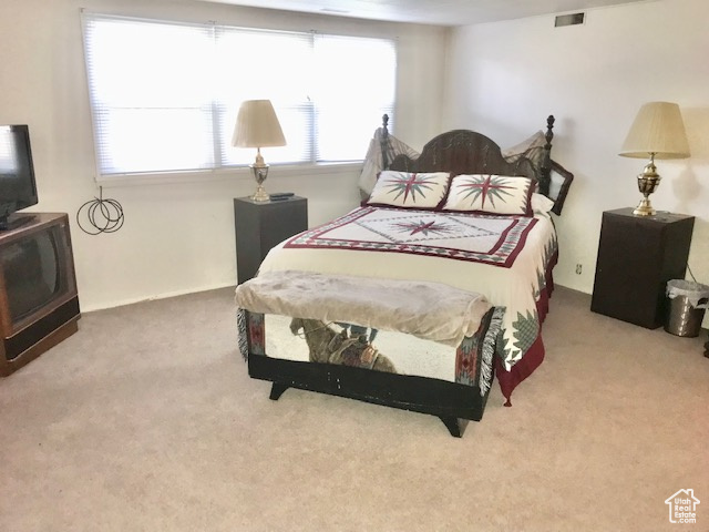 Bedroom featuring carpet flooring