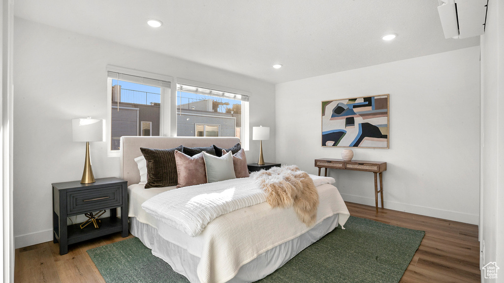 Bedroom featuring hardwood / wood-style flooring