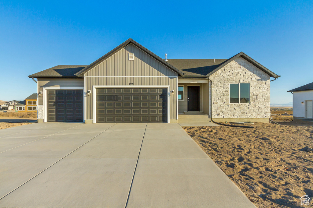 View of front of home with a garage