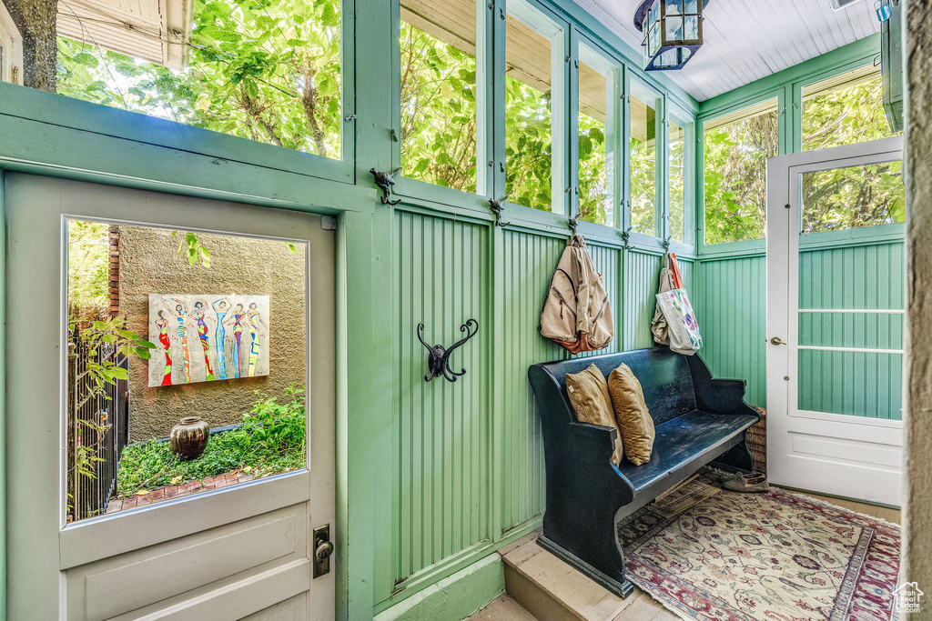Sunroom / solarium featuring a wealth of natural light