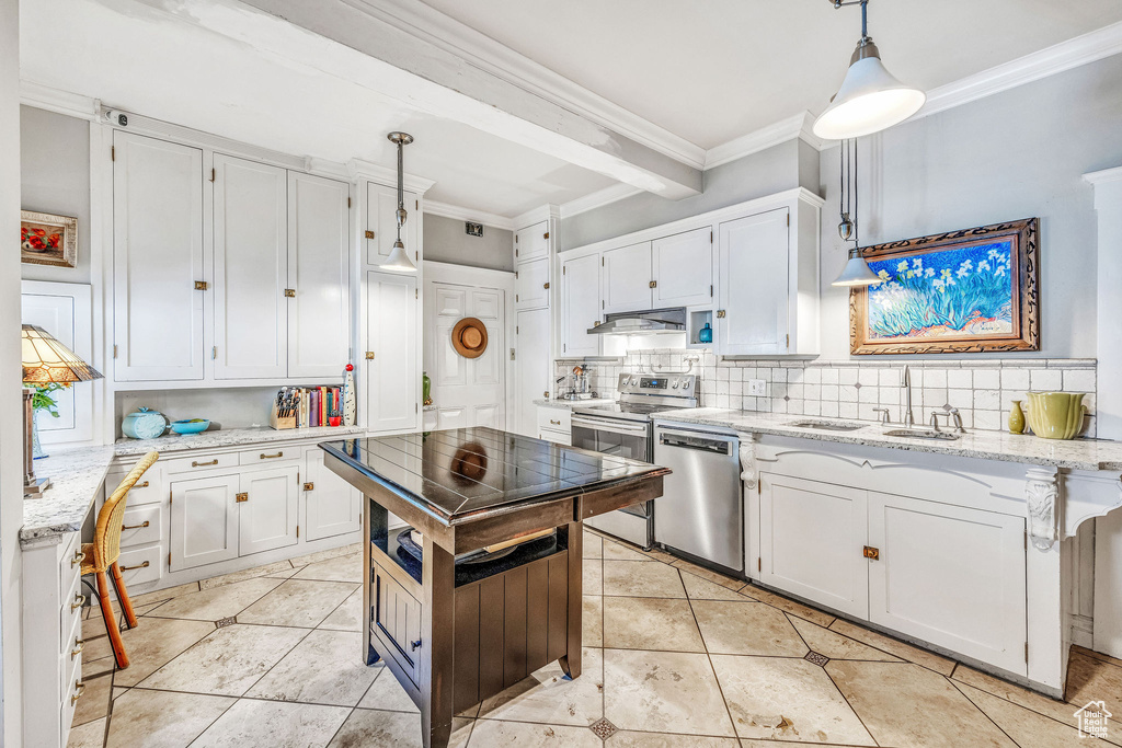 Kitchen with dishwasher, white cabinets, backsplash, and light tile patterned floors