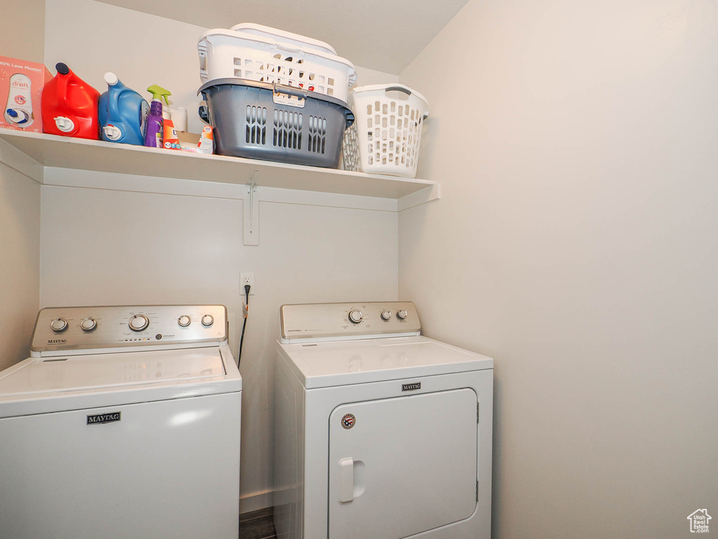 Clothes washing area with washer and clothes dryer