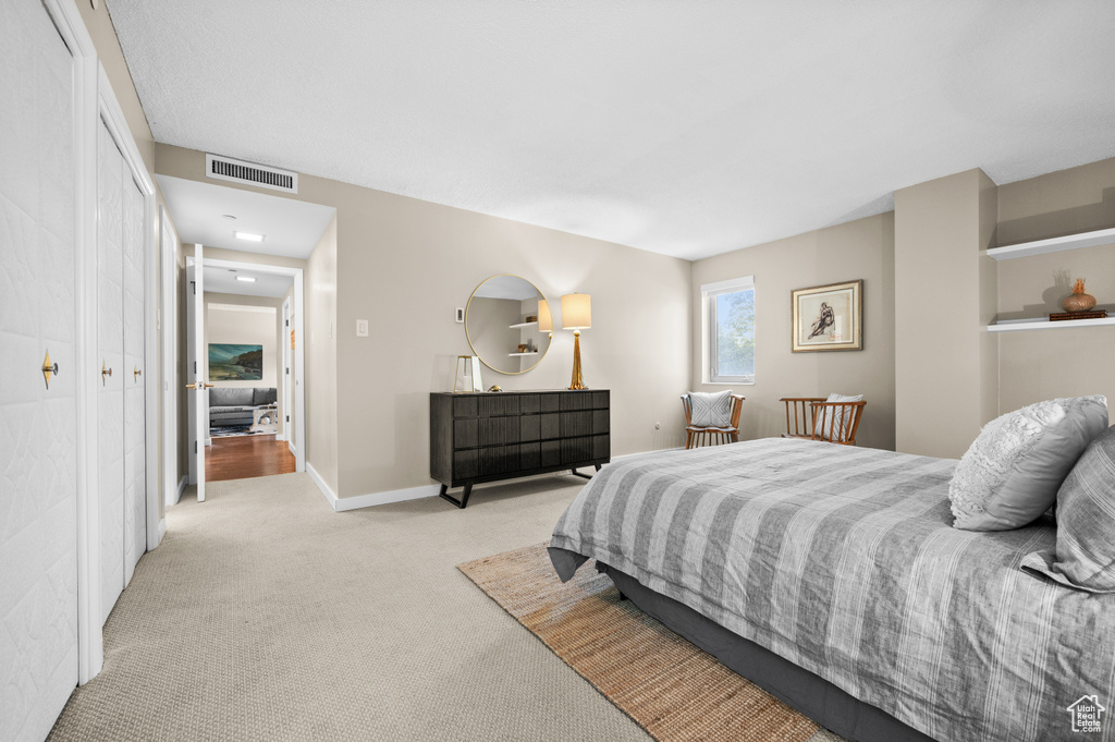 View of carpeted bedroom