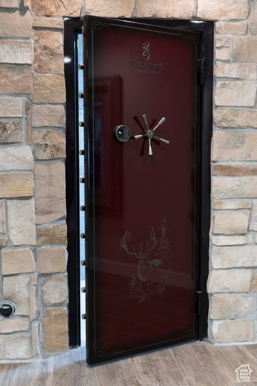 Exterior details featuring hardwood / wood-style floors