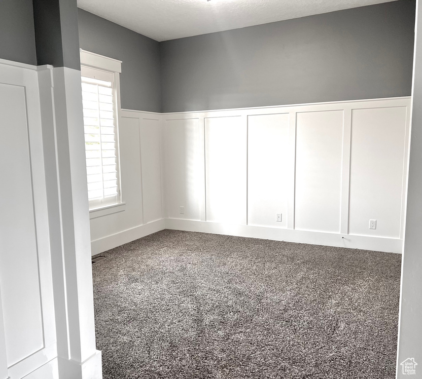 Spare room with carpet