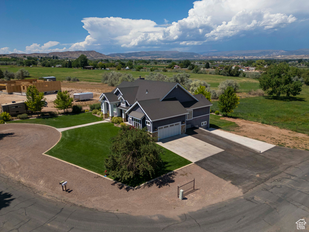 Birds eye view of property featuring a mountain view