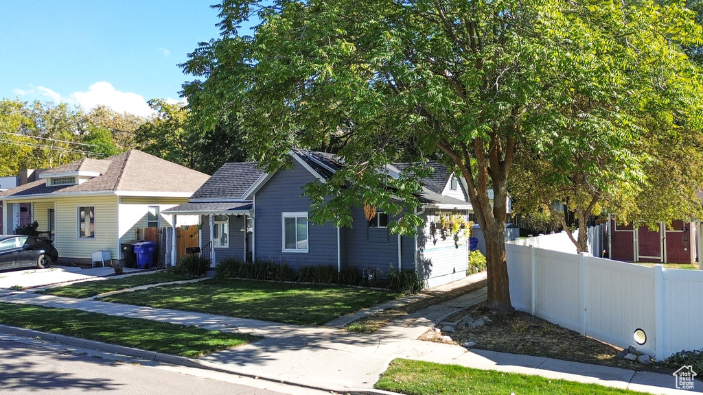 View of front of house with a front lawn