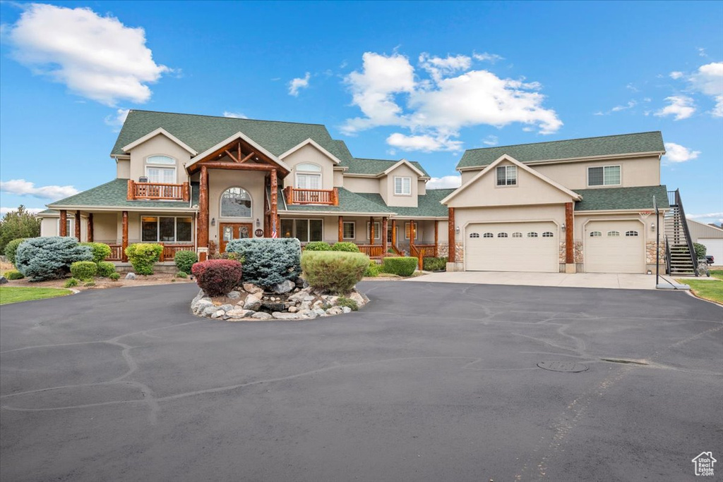 View of front of property with a garage