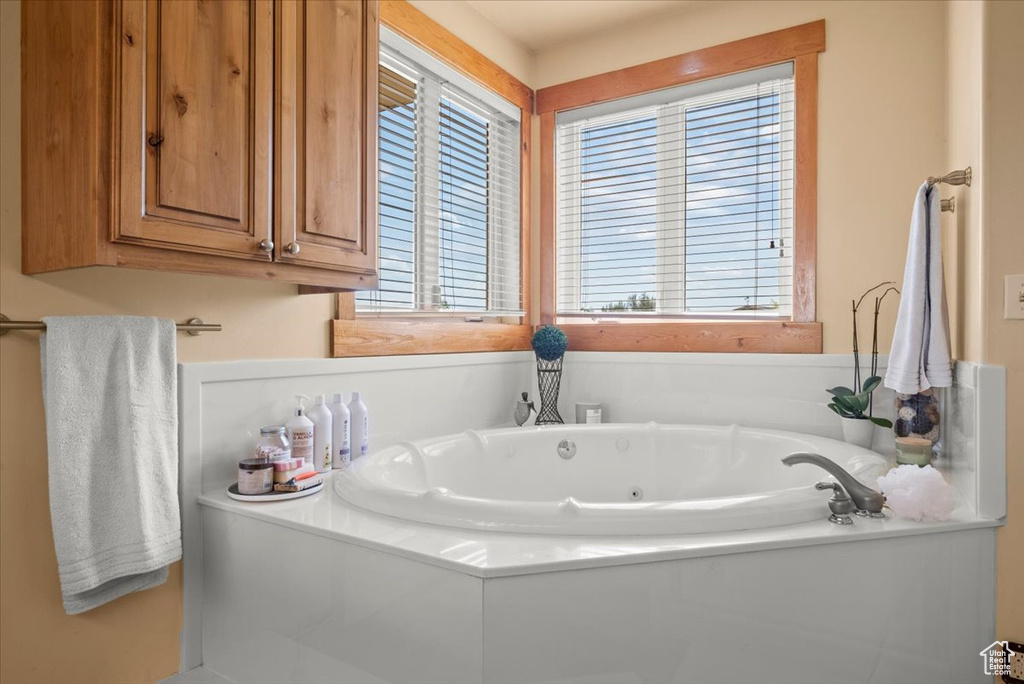 Bathroom with a washtub