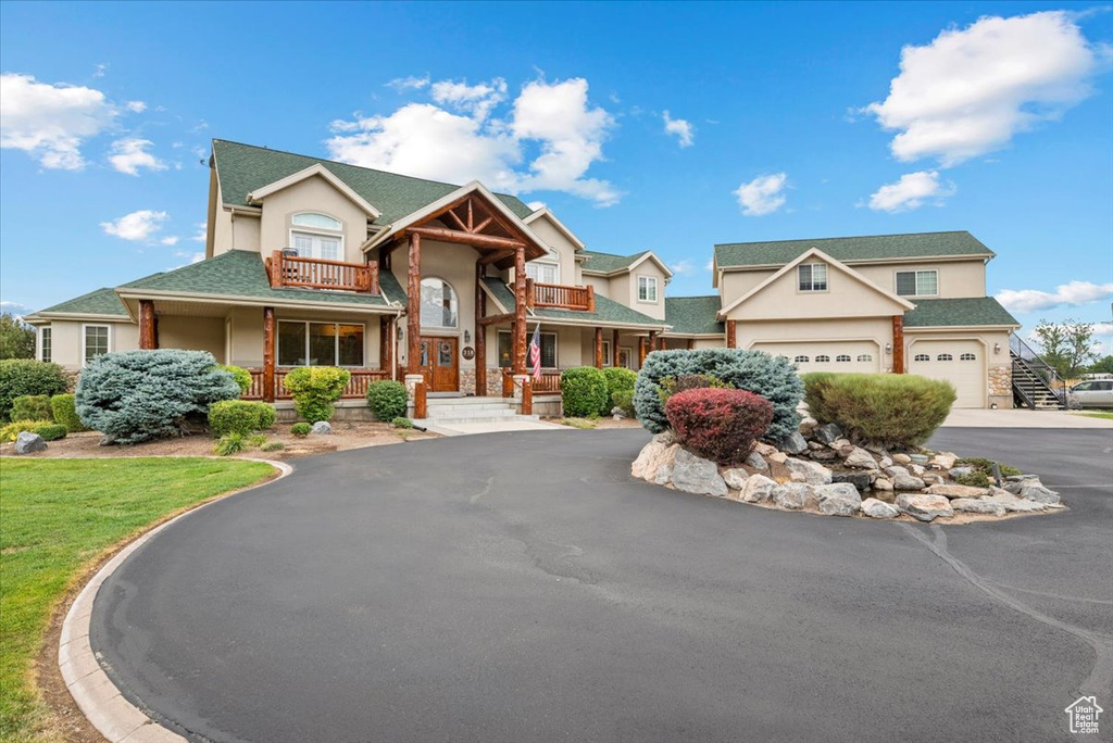 View of front of property with a garage