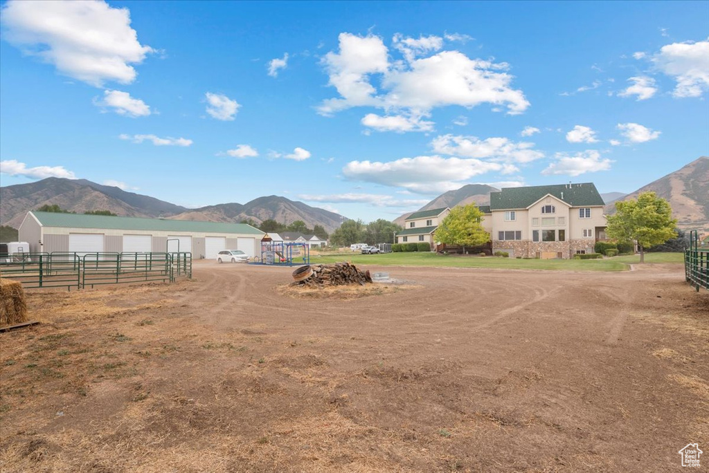 View of yard with a mountain view