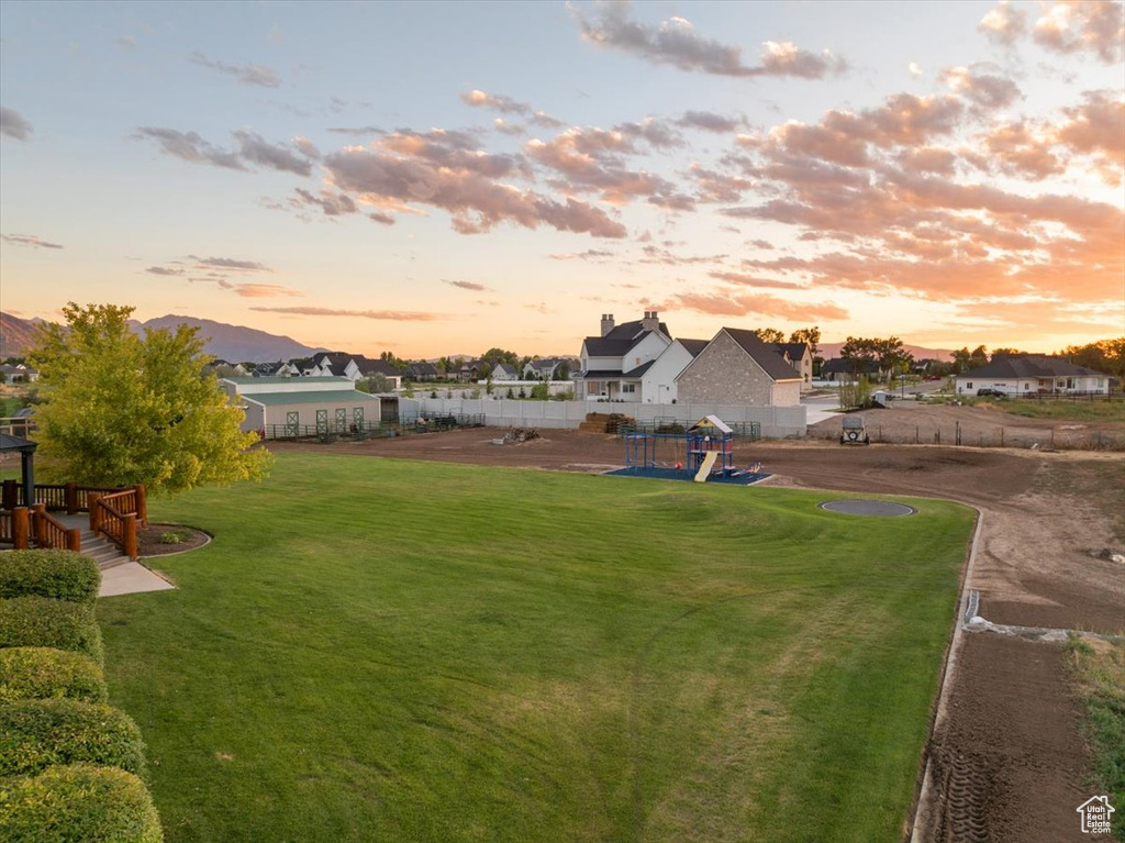 View of yard at dusk