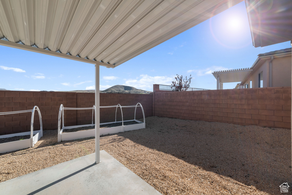 View of yard with a patio