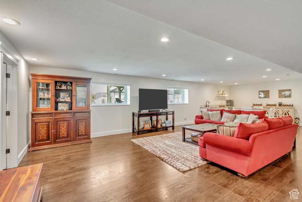 Living room with wood-type flooring