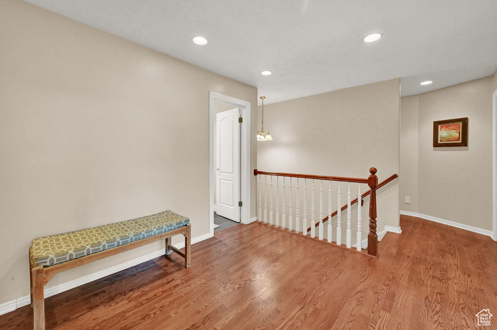 Hallway featuring hardwood / wood-style flooring