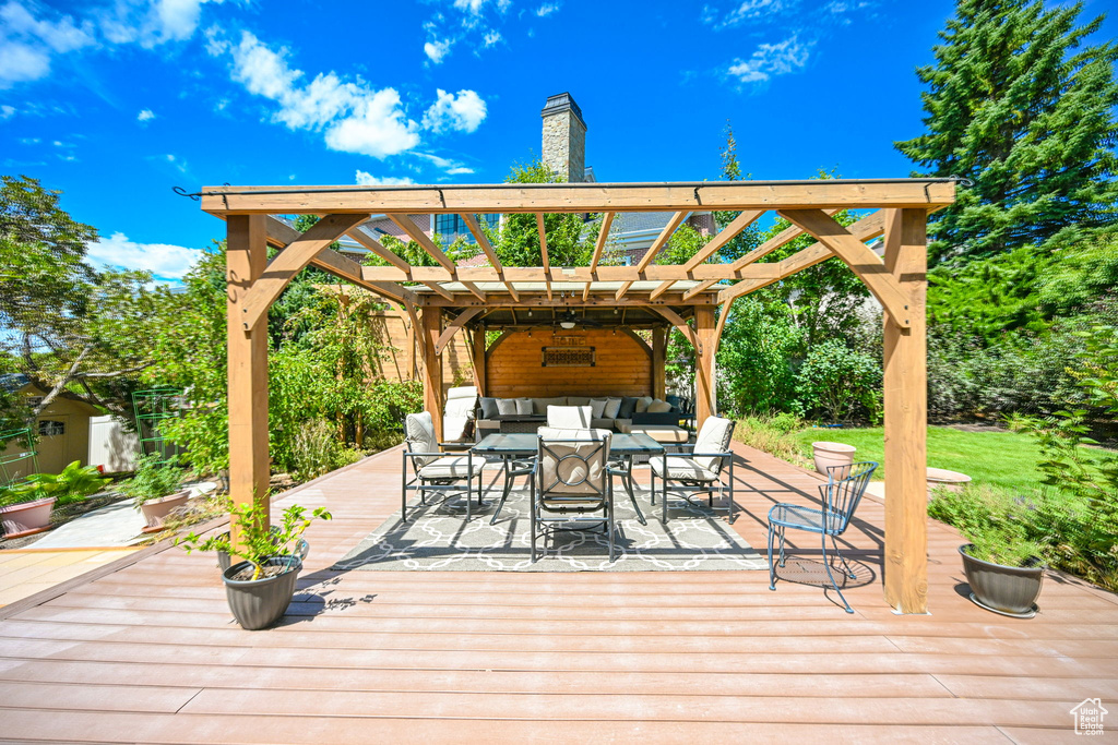 Wooden terrace with a pergola