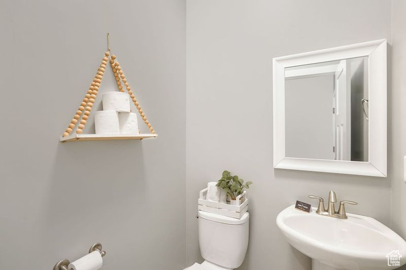 Bathroom with sink and toilet