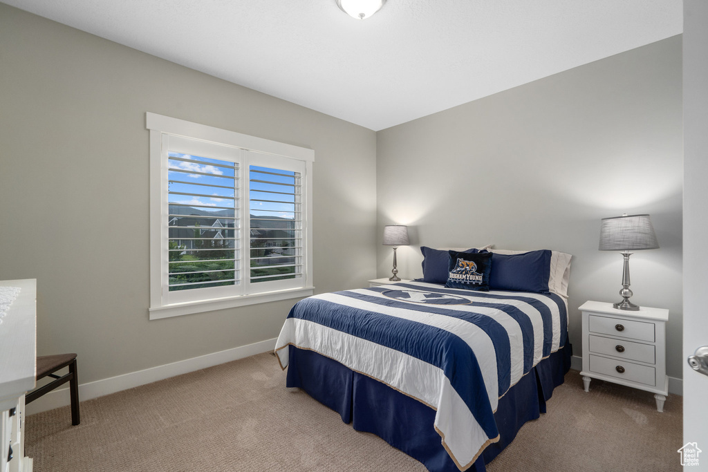 View of carpeted bedroom