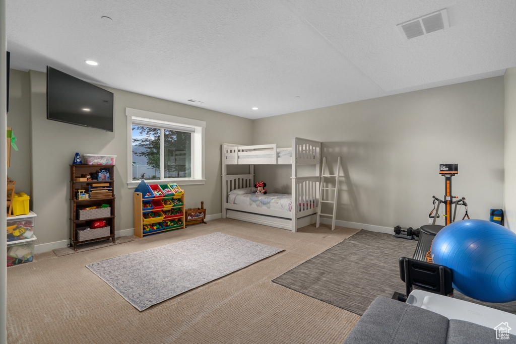 View of carpeted bedroom