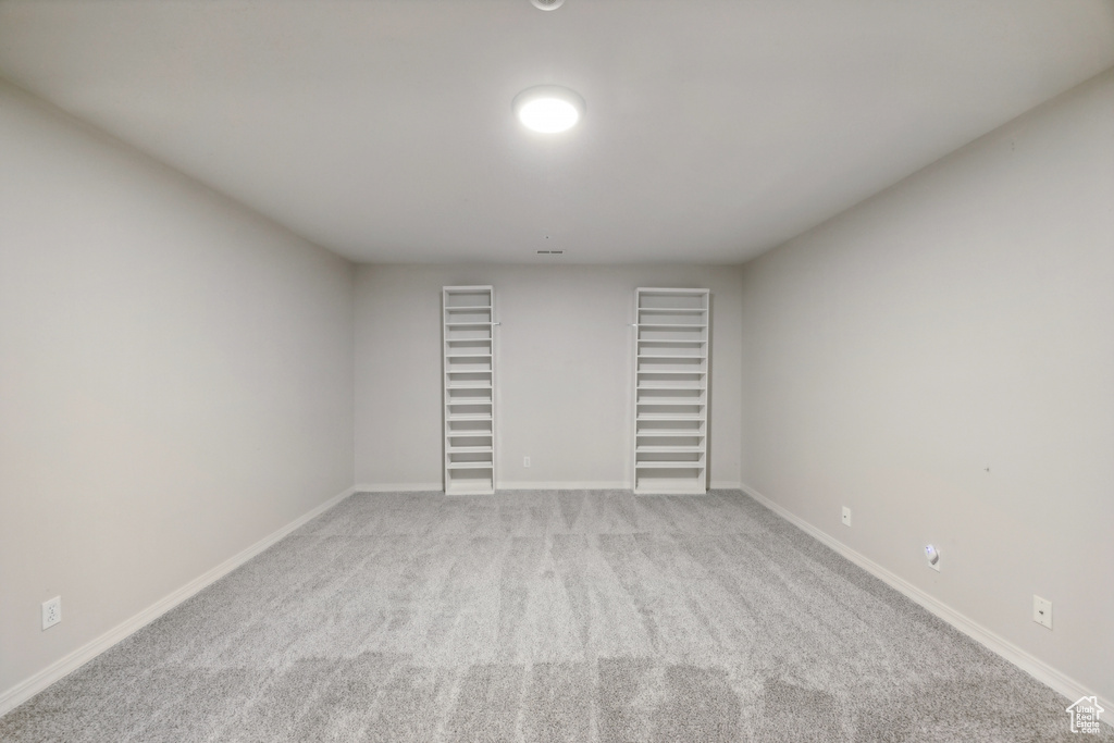 Spare room with light colored carpet