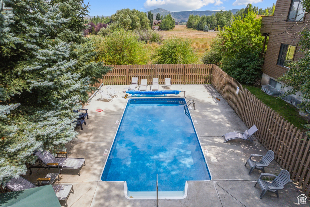 View of pool featuring a patio