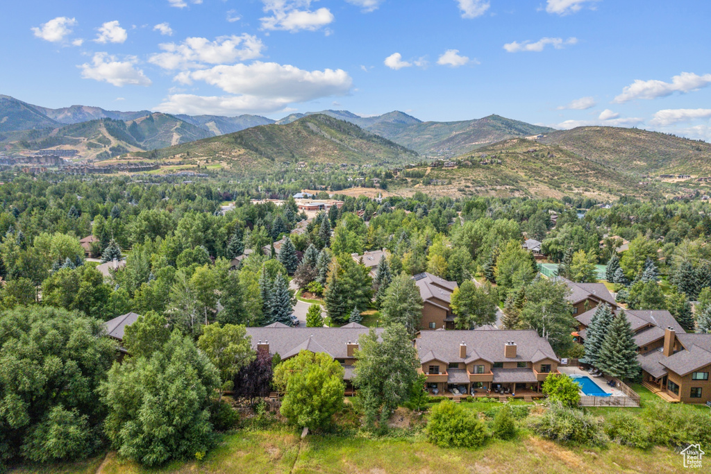 Birds eye view of property with a mountain view