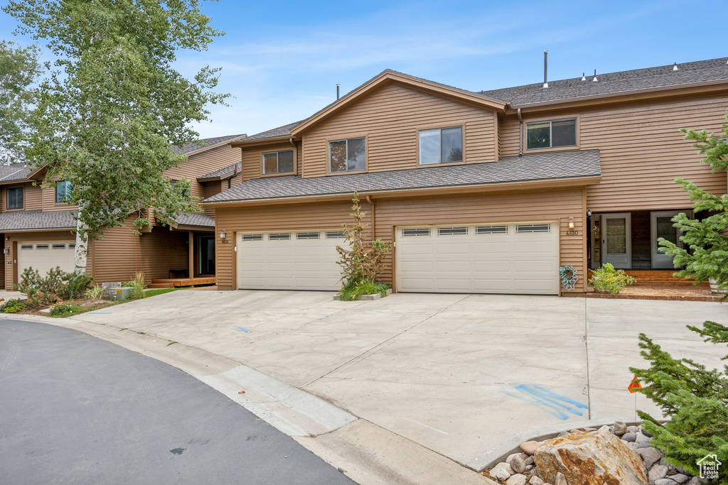 View of front of home featuring a garage