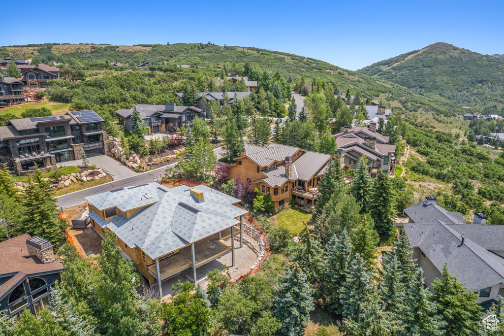 Birds eye view of property featuring a mountain view