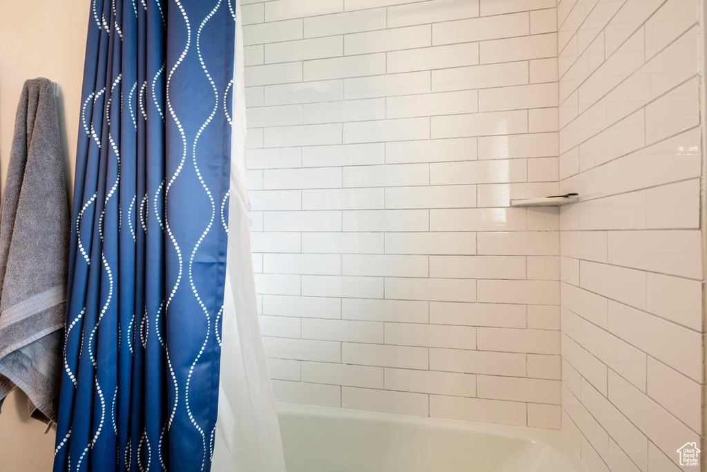 Bathroom featuring shower / tub combo