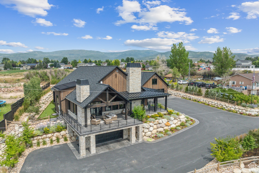 View of front of house featuring a mountain view