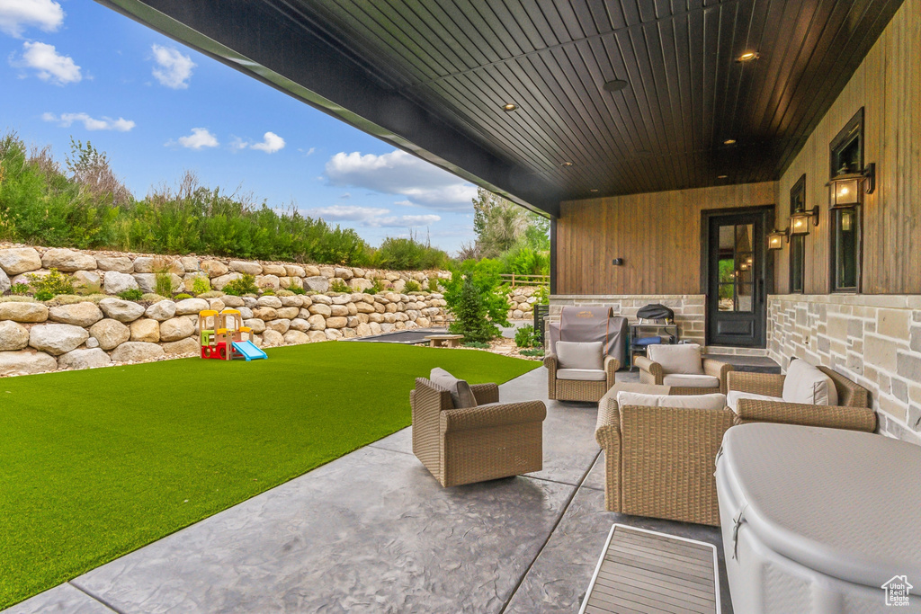 View of patio featuring an outdoor living space