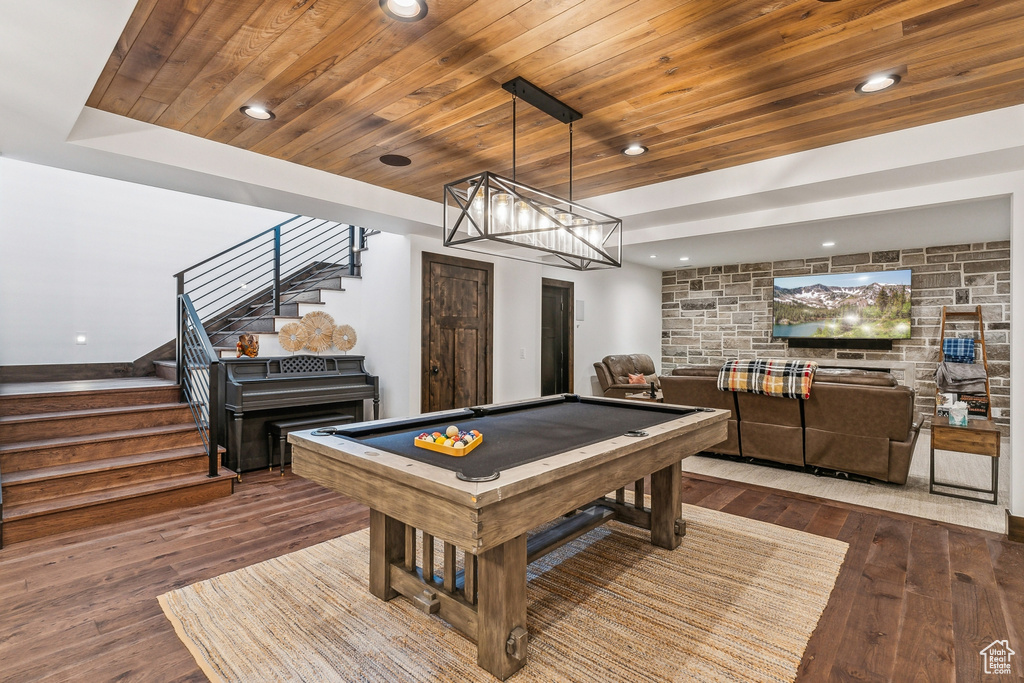 Game room featuring wood-type flooring, billiards, and wooden ceiling