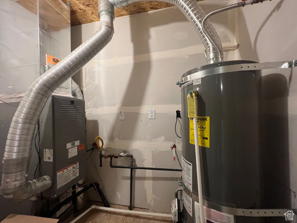 Utility room with strapped water heater