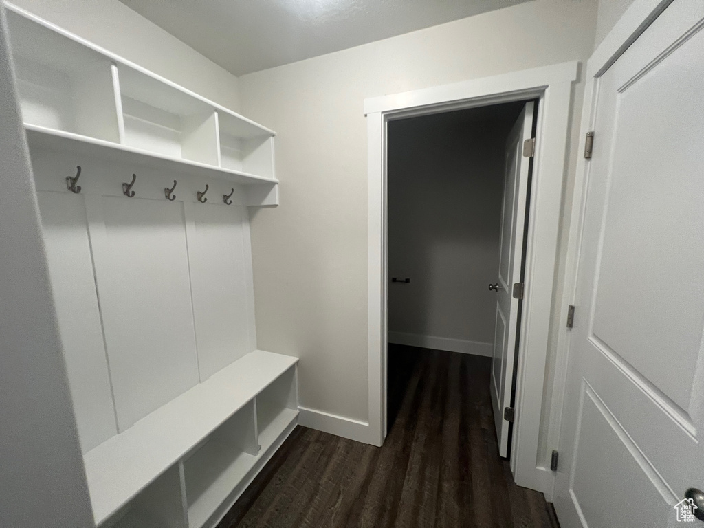 Mudroom with dark hardwood / wood-style flooring