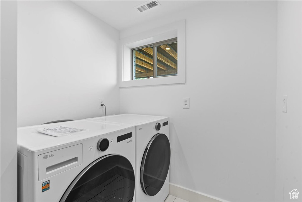 Laundry room featuring washer and dryer