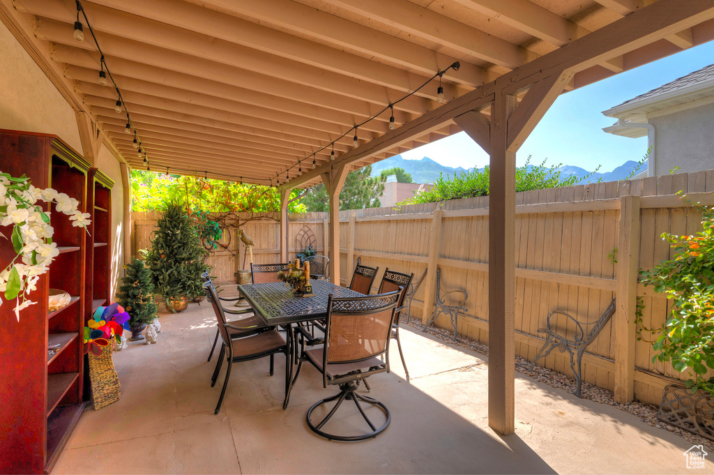 View of patio / terrace featuring a mountain view