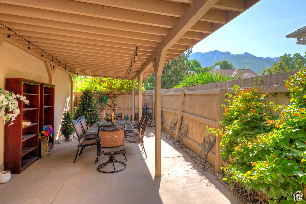 View of patio / terrace featuring a mountain view