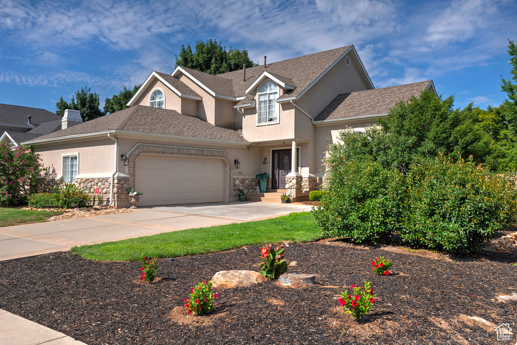 View of front facade with a garage