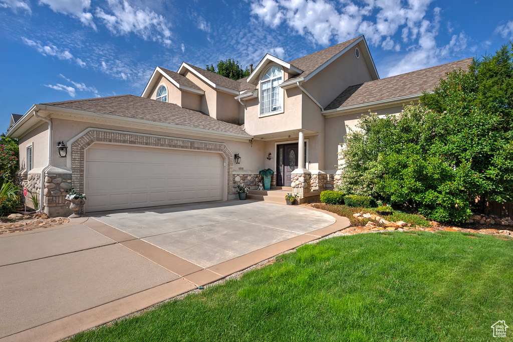 View of front of home with a front lawn