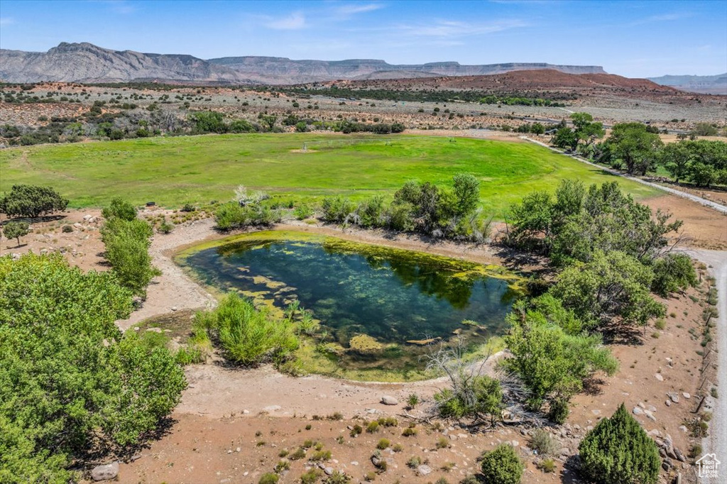 Birds eye view of property featuring a mountain view